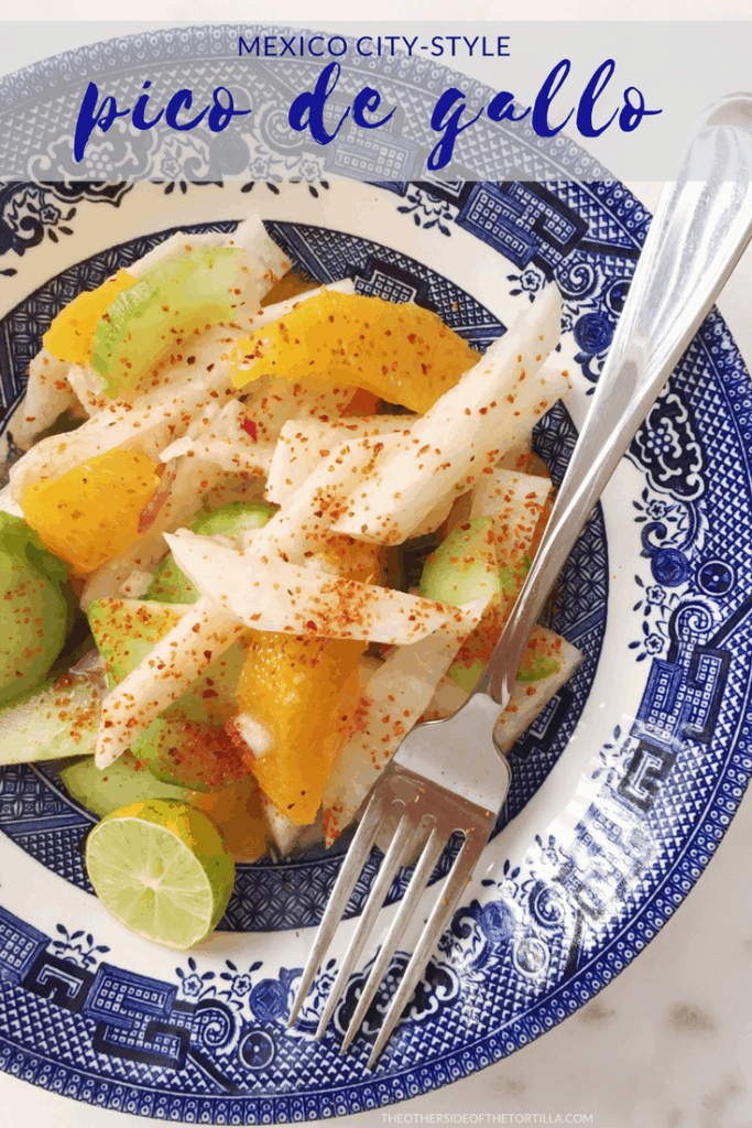 Mexico City-style pico de gallo jicama, citrus and cucumber salad sprinkled with lime juice and Tajín