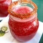 red prickly pear frozen margarita in a glass