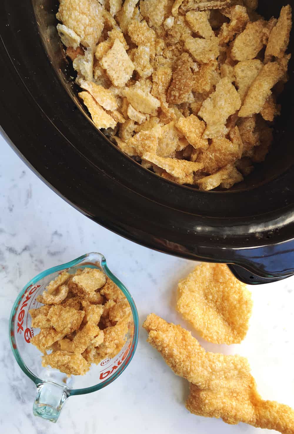 How to make tacos de chicharrón guisado in the slow-cooker via theothersideofthetortilla.com