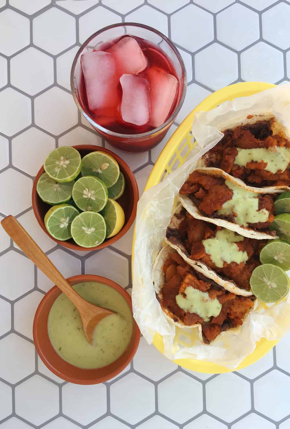 Pork rinds with guacamole on traditional Mexican comal Stock Photo