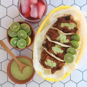 How to make tacos de chicharrón guisado in the slow-cooker via theothersideofthetortilla.com