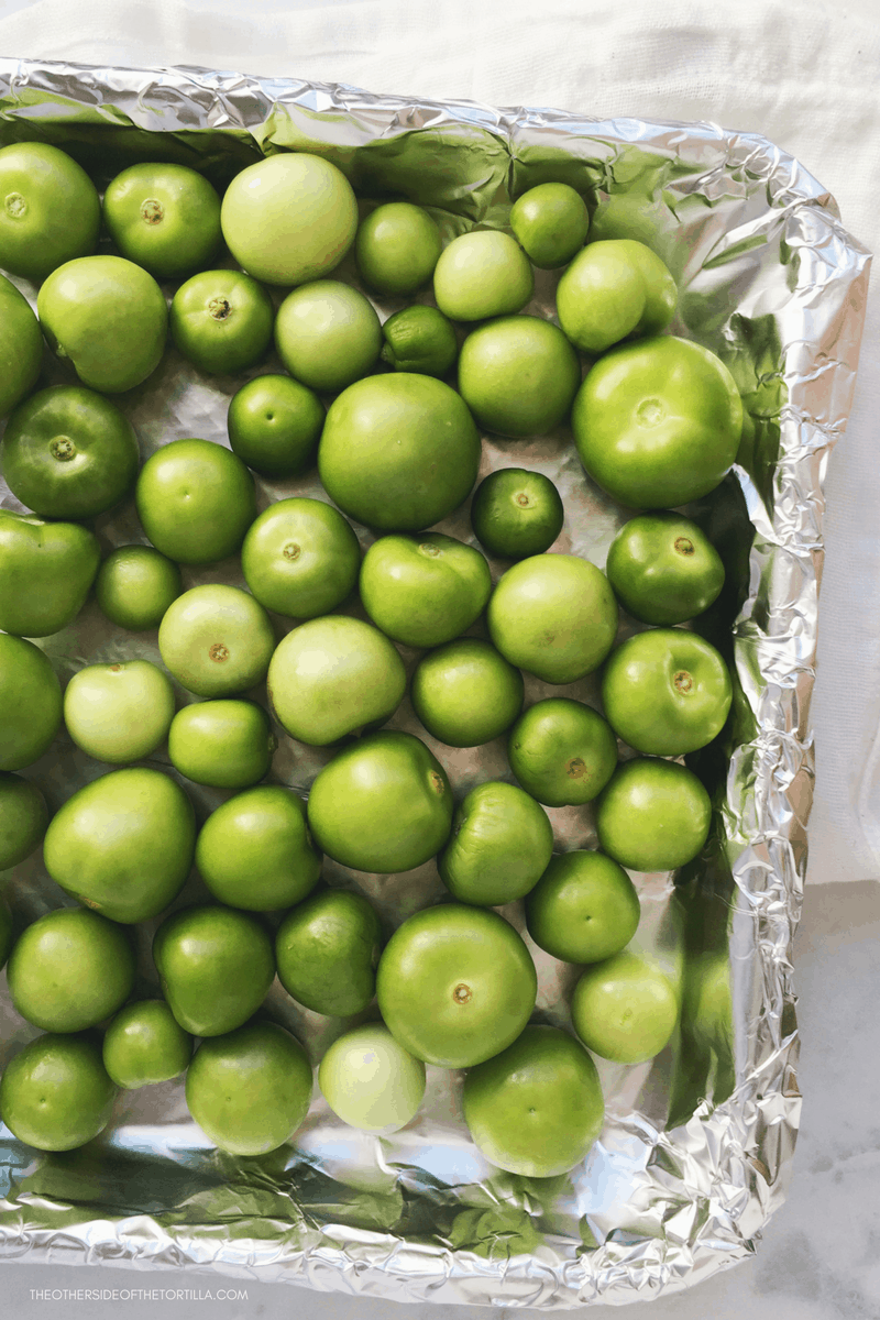 Roasting tomatillos to make salsa de chile morita