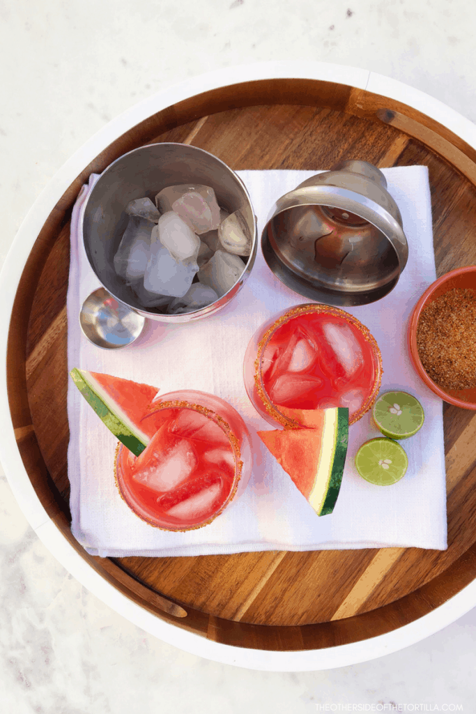 A quick and easy watermelon margarita that serves 2 but can easily be doubled or tripled to serve a crowd. Get this recipe on theothersideofthetortilla.com. #margaritas #mexicanfood #mexican