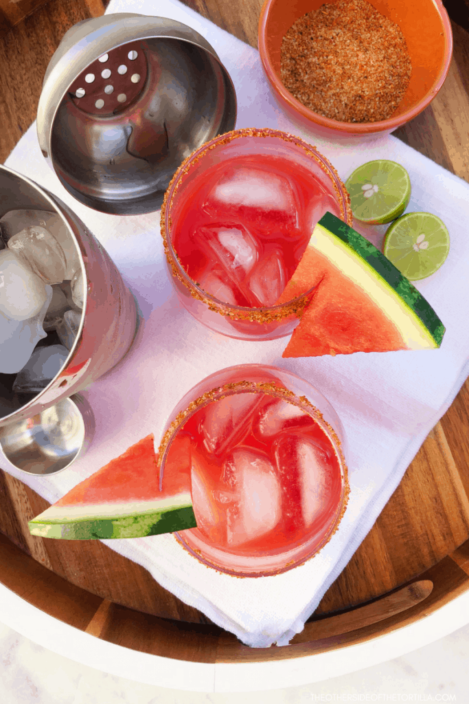 A quick and easy watermelon margarita that serves 2 but can easily be doubled or tripled to serve a crowd. Get this recipe on theothersideofthetortilla.com. #margaritas #mexicanfood #mexican