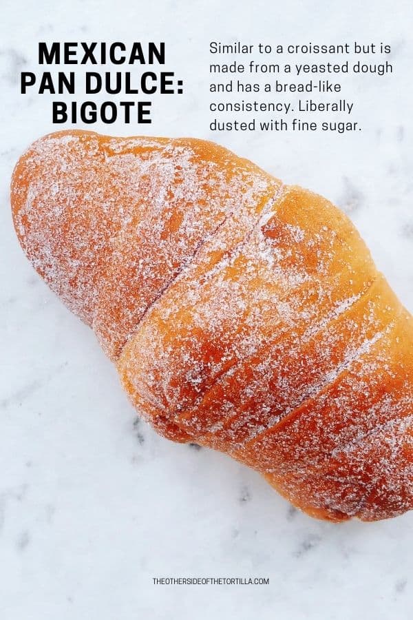 Mexican pan dulce bigote on a white marble background