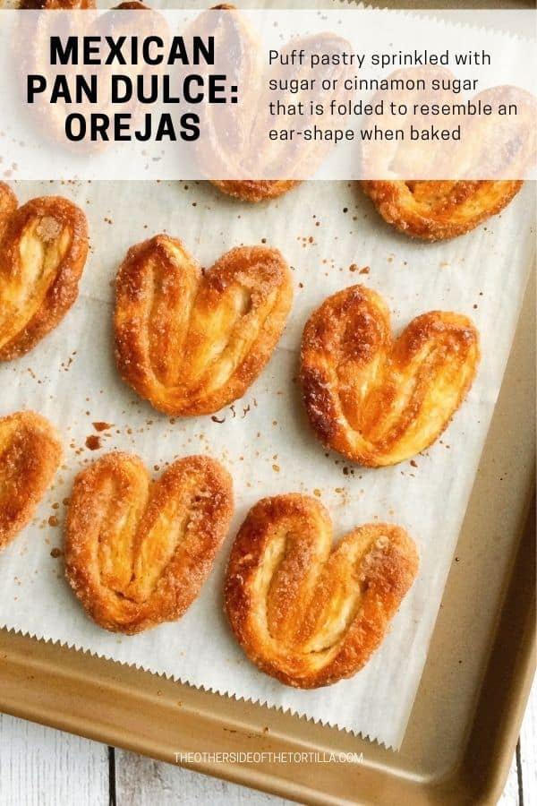 Mexican pan dulce orejas on a baking sheet